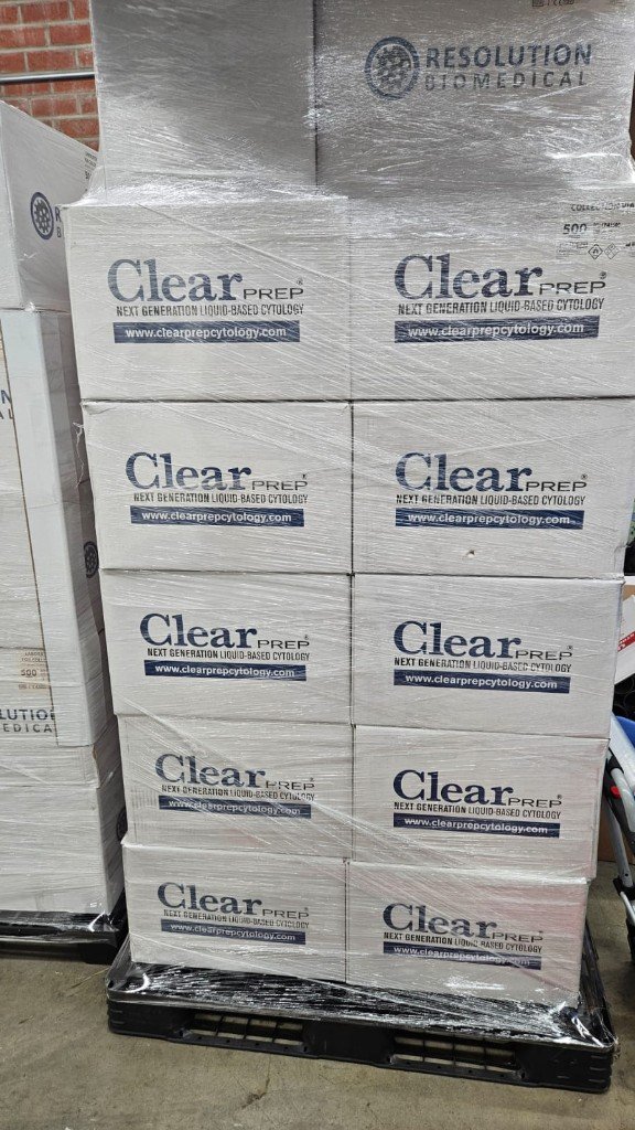 Professionally stacked and wrapped commercial cartons on pallets